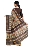 Cream with brown color and floral design tussar silk saree